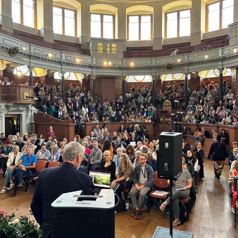 Bessel van der Kolk presenting in the Sheldonian Theatre